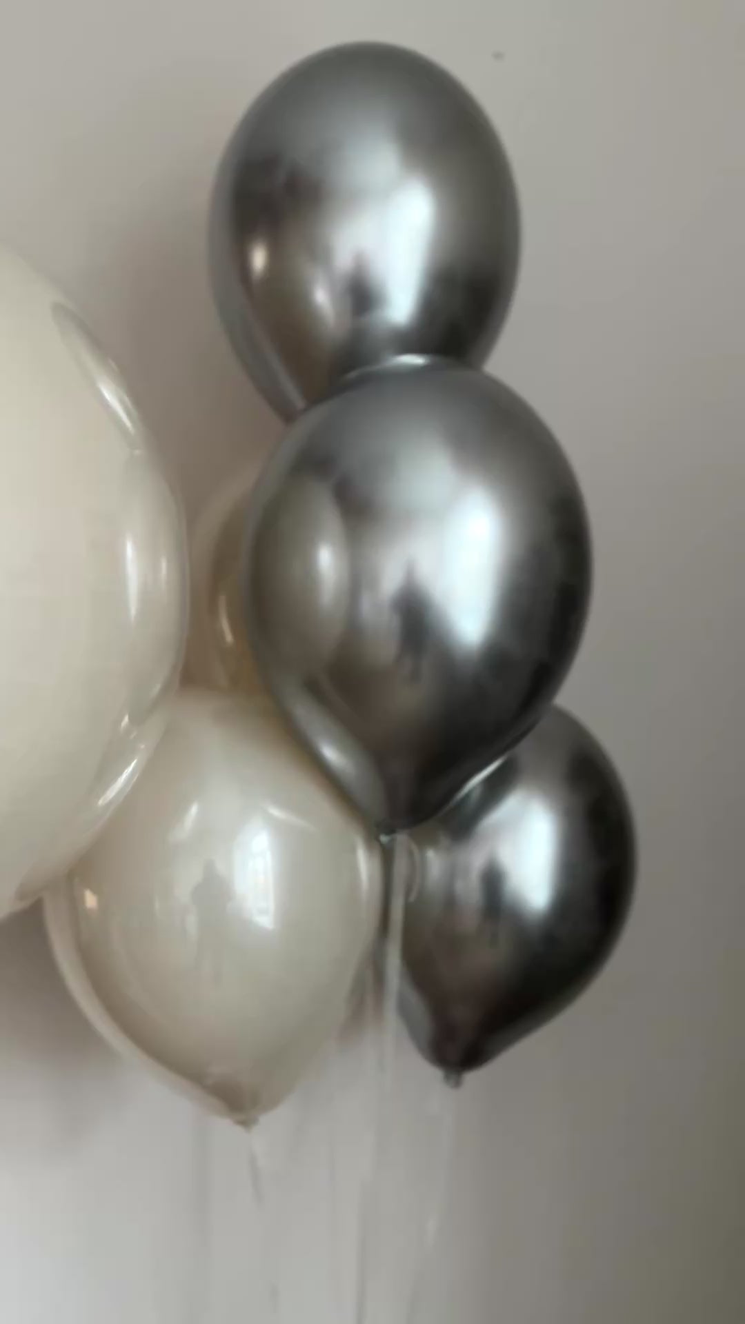 Video of pearl and silver bubble balloon set with personalized sign and coordinating balloons in NYC
