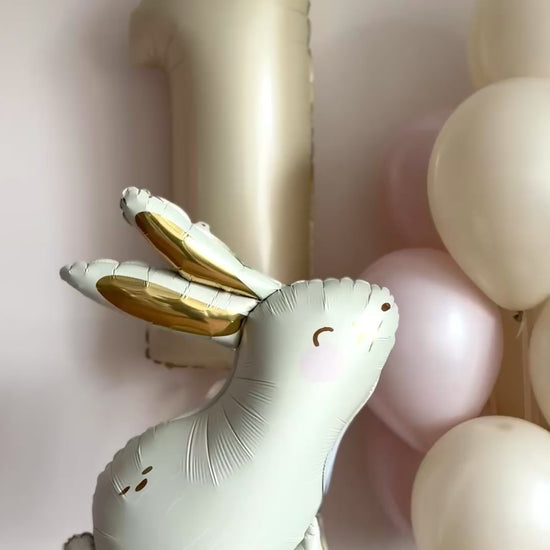 Video of blush bunny balloon set with number balloon for birthday celebration decor in NYC
