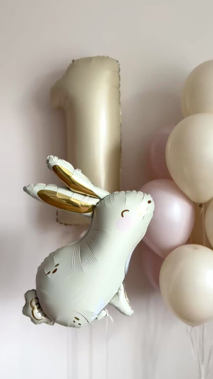 Video of blush bunny balloon set with number balloon for birthday celebration decor in NYC
