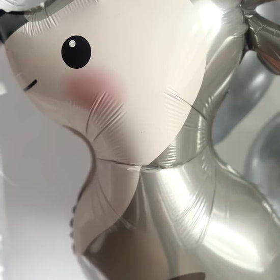 Video of white and silver bunny balloon set with personalized heart balloon for party decor in NYC