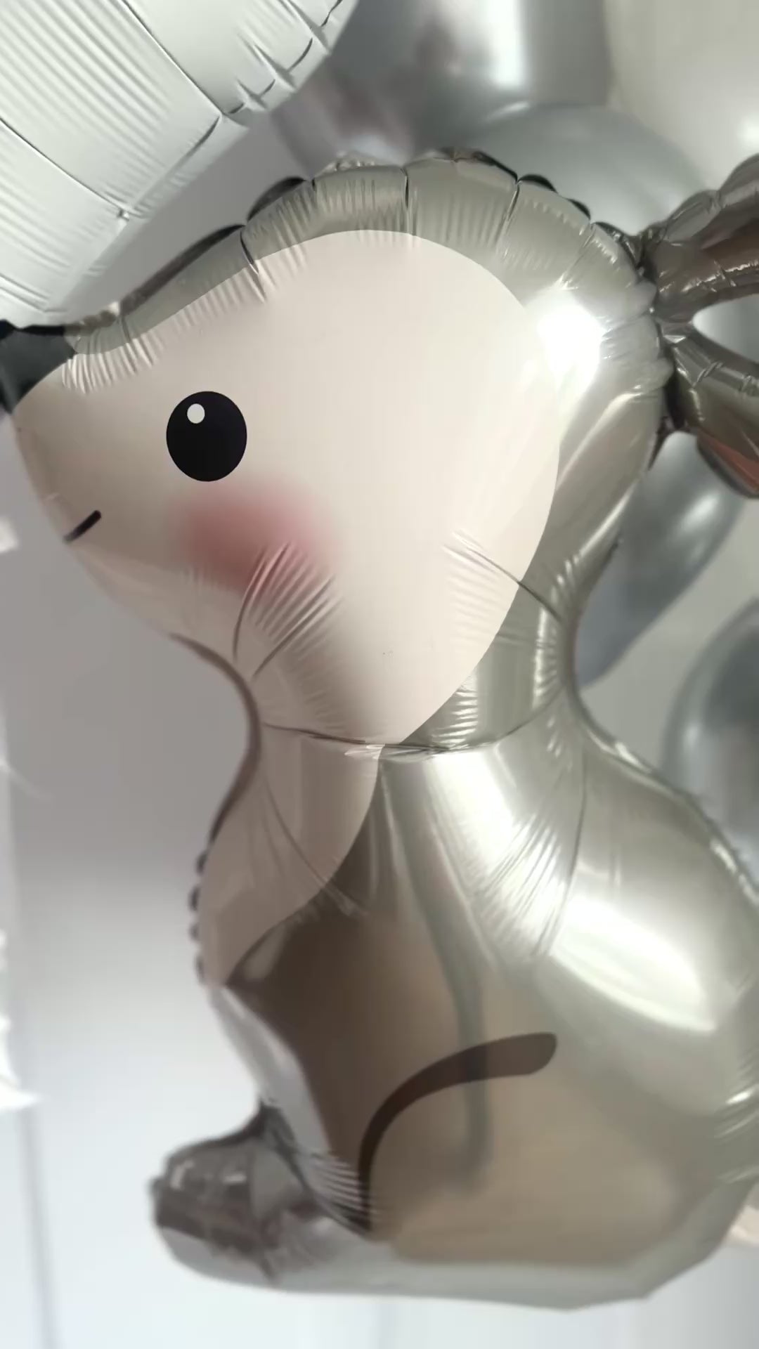 Video of white and silver bunny balloon set with personalized heart balloon for party decor in NYC