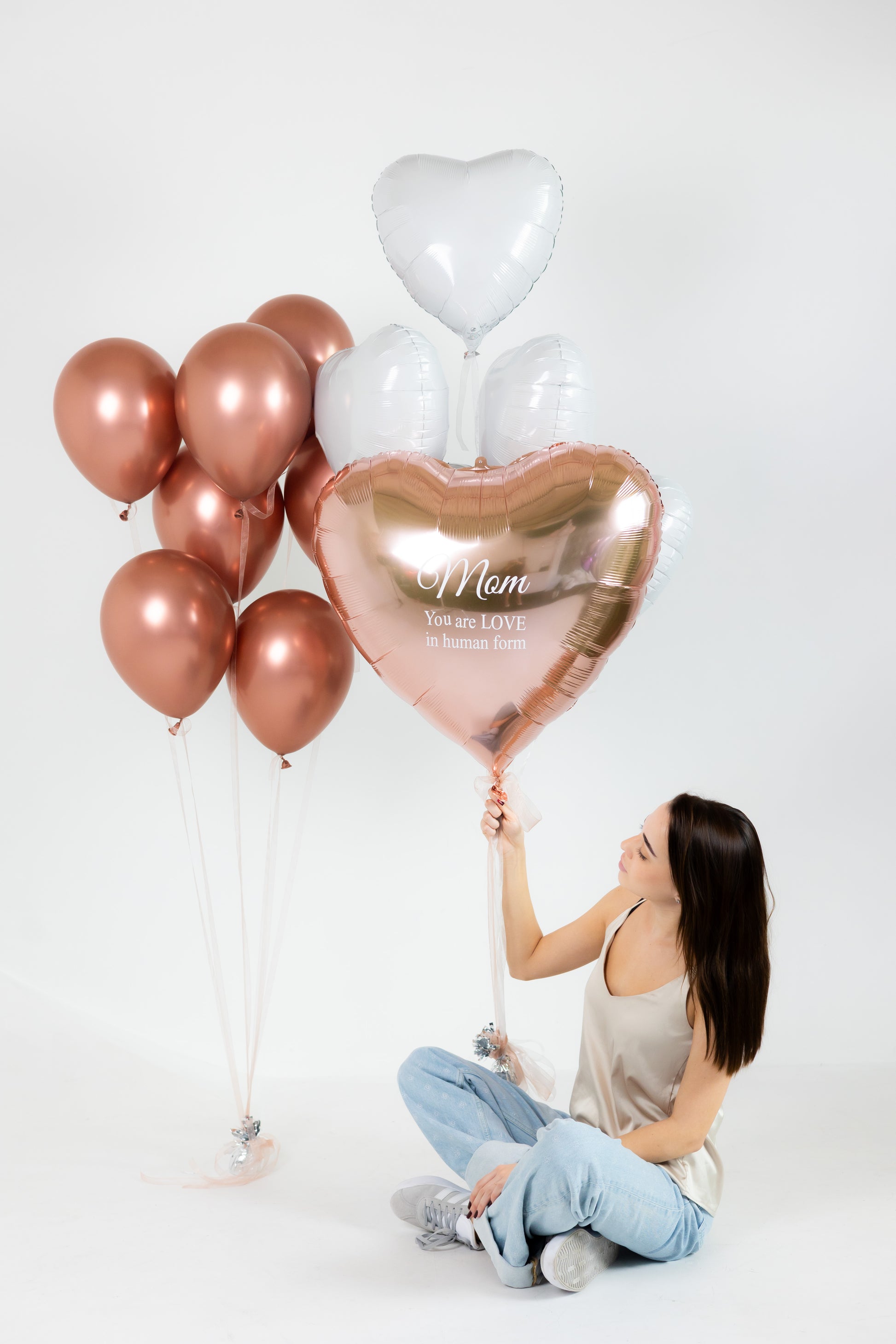 Romantic balloon decor with custom heart balloon and rose gold heart balloons in Brooklyn