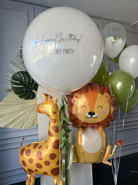 Safari party balloon set with custom sign bubble balloon, animal foil balloons, and green birthday decor in New York