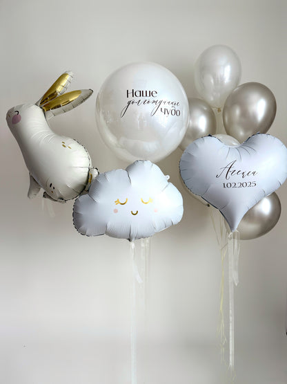 Close-up of baby welcome balloon decor with rabbit balloon and custom heart balloon in Brooklyn