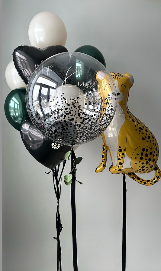 Wild and Elegant balloon set with personalized bubble balloon, leopard balloon, and jungle party decor in New York